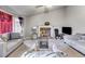 Spacious living room with a stone fireplace, vaulted ceilings, and neutral color palette at 674 Fairview Dr, Dallas, GA 30157