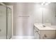 Bathroom featuring a glass door shower, a mirror, and a vanity at 7 Chief Matthews Rd # 2A, Decatur, GA 30030