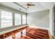 Bright bedroom with hardwood floors, ceiling fan, and large windows at 7 Chief Matthews Rd # 2A, Decatur, GA 30030