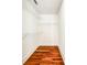 Walk-in closet with hardwood floors and racks for storing items at 7 Chief Matthews Rd # 2A, Decatur, GA 30030