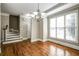 Elegant dining room with hardwood floors, crown molding, and staircase access at 7 Chief Matthews Rd # 2A, Decatur, GA 30030