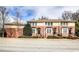 Attractive townhome with brick accents, white trim, and neat landscaping along a quiet street at 7 Chief Matthews Rd # 2A, Decatur, GA 30030