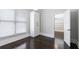 Bedroom featuring hardwood floors, ample natural light, and a closet at 745 Fountainhead Ne Ln # 112, Atlanta, GA 30324