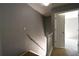Hallway with stairs leading to a bedroom with an open doorway at 1102 Wedgewood Way, Atlanta, GA 30350