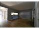 Inviting living room with wood floors, fireplace, and a peek into the kitchen, great for entertaining at 1102 Wedgewood Way, Atlanta, GA 30350