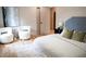 Bright bedroom features hardwood floors, decor, and ample closet space at 1395 Winburn Dr, East Point, GA 30344