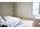 Bedroom with hardwood floors, neutral walls, and a sunny window at 1395 Winburn Dr, East Point, GA 30344