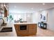 Kitchen island includes microwave and countertop overlooking dining and living areas at 1395 Winburn Dr, East Point, GA 30344