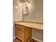 Bathroom with a light-colored sink and vanity with tile flooring, and a three-bulb light above the sink at 2264 Pryor Rd, Atlanta, GA 30315