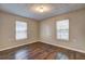 Cozy bedroom with hardwood floors and natural light at 2264 Pryor Rd, Atlanta, GA 30315