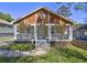 Charming bungalow with a covered front porch, cedar shake accents, and a well-manicured lawn at 2264 Pryor Rd, Atlanta, GA 30315