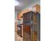 Kitchen with wooden cabinets, black gas stove and refrigerator at 2264 Pryor Rd, Atlanta, GA 30315