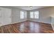 Living room with hardwood floors, natural light, and neutral paint at 2264 Pryor Rd, Atlanta, GA 30315