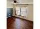 Bedroom with hardwood floors and a window with privacy blinds at 2499 Sinclair Trce, Powder Springs, GA 30127