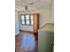 Sun-drenched bedroom complete with hardwood floors and ceiling fan at 2499 Sinclair Trce, Powder Springs, GA 30127