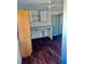 Laundry area features extra cabinet storage and utility hookups at 2499 Sinclair Trce, Powder Springs, GA 30127