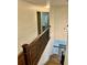 Stairway with decorative wooden railing and decorative trim at 2499 Sinclair Trce, Powder Springs, GA 30127