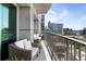 Relax on this comfortable balcony with city views and plenty of space to lounge at 943 Peachtree Ne St # 1910, Atlanta, GA 30309