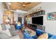 Comfortable sitting room with city views and access to a private balcony at 943 Peachtree Ne St # 1910, Atlanta, GA 30309