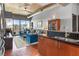 Living room view featuring a modern design, city views, stylish furniture, and hardwood floors at 943 Peachtree Ne St # 1910, Atlanta, GA 30309