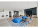 Relaxing community lounge with cozy seating, TV, and kitchenette for residents at 943 Peachtree Ne St # 1910, Atlanta, GA 30309