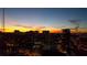 Night view of city skyline at dusk with soft orange and blue skyline at 943 Peachtree Ne St # 1910, Atlanta, GA 30309
