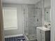 Modern bathroom featuring an enclosed glass shower and stylish vanity at 1276 Seattle Slew Ln, Norcross, GA 30093