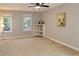 Bright bedroom showcasing natural light and built-in shelving at 1276 Seattle Slew Ln, Norcross, GA 30093