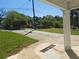 Large, concrete driveway with a unique design leads to a well-maintained green lawn at 1276 Seattle Slew Ln, Norcross, GA 30093