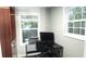 This office features natural light and a functional desk area, perfect for working from home at 1276 Seattle Slew Ln, Norcross, GA 30093