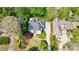 Aerial view of an upscale brick home showcasing its landscaped yard and neighborhood at 1418 Waterford Green Dr, Marietta, GA 30068
