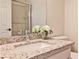 Bathroom featuring a sink with granite countertops and cabinet storage at 1418 Waterford Green Dr, Marietta, GA 30068