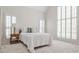 Bright bedroom with many windows featuring shutter, providing ample natural light and a cozy atmosphere at 1418 Waterford Green Dr, Marietta, GA 30068