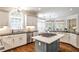 Open concept kitchen with granite counters, stainless appliances, custom cabinets, and a central island at 1418 Waterford Green Dr, Marietta, GA 30068