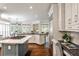 Spacious kitchen with stainless steel appliances, granite countertops, custom cabinets, and center island at 1418 Waterford Green Dr, Marietta, GA 30068