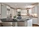 Gourmet kitchen boasts stainless appliances, granite counters, and a central island with bar seating at 1418 Waterford Green Dr, Marietta, GA 30068