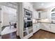 Gourmet kitchen with stainless steel appliances and adjacent dining area at 1418 Waterford Green Dr, Marietta, GA 30068