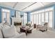 Bright living room showcasing plantation shutters, fireplace, and comfortable seating at 1418 Waterford Green Dr, Marietta, GA 30068