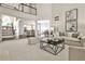 Bright living room with vaulted ceiling and open floor plan and access to kitchen at 1418 Waterford Green Dr, Marietta, GA 30068