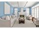 Cozy living room with fireplace, plantation shutters, and ample seating at 1418 Waterford Green Dr, Marietta, GA 30068