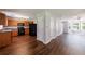 Kitchen with black appliances and wooden cabinets with an attached dining room at 2075 Ivy Ln, Union City, GA 30291
