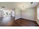 Bright living room featuring hardwood floors and large windows at 2075 Ivy Ln, Union City, GA 30291