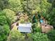 Aerial view of the property with pool and mature trees providing privacy at 5534 Blackhawk Dr, Acworth, GA 30102