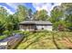 Expansive backyard view showcases the home and outdoor enjoyment area at 5534 Blackhawk Dr, Acworth, GA 30102