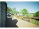 Expansive wooden deck offering scenic views of the backyard and surrounding greenery at 660 Allens Landing Dr, Lawrenceville, GA 30045