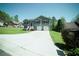 Beautifully landscaped front yard leading up to a charming two-story home at 660 Allens Landing Dr, Lawrenceville, GA 30045
