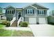 Inviting two-story home with a neatly maintained yard and a two-car garage at 660 Allens Landing Dr, Lawrenceville, GA 30045