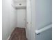 Hallway with wood floors leading to multiple rooms at 660 Allens Landing Dr, Lawrenceville, GA 30045
