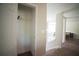 View of a hallway closet with a wire shelf and a light switch at 660 Allens Landing Dr, Lawrenceville, GA 30045
