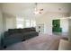 Open-concept living room adjacent to kitchen and dining areas at 660 Allens Landing Dr, Lawrenceville, GA 30045